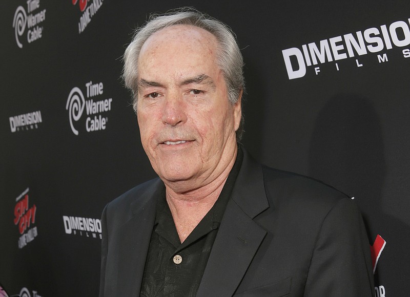 
              FILE - In this Aug. 19, 2014 file photo, actor Powers Boothe attends the Los Angeles premiere of "Sin City: A Dame To Kill For" in Los Angeles. Boothe, the character actor known for his villain roles in TV’s “Deadwood,” and in the movies “Tombstone,” “Sin City” and “The Avengers,” died Sunday, May 14, 2017. He was 68. (Photo by Todd Williamson/Invision/AP, File)
            