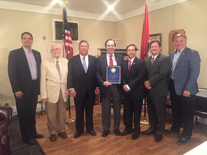 Judge Clarence Shattuck accepts the Howard Sompayrac Community Service Award. From left are club member and County Commissioner Greg Martin, member Dr. Wayne Shearer, member and County Mayor Jim Coppinger, Shattuck, Congressman Chuck Fleischmann, Hixson Kiwanis Club president David Queen and Hamilton County Assessor of Property Marty Haynes.