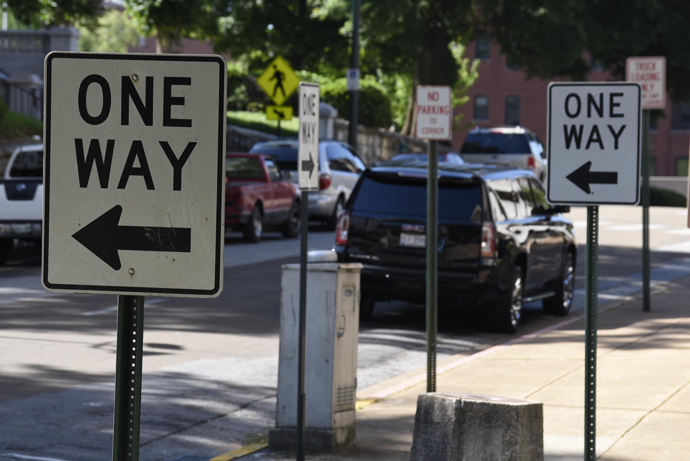 One-way signs direct motorists at the corner of Walnut and 6th streets. The Chattanooga City Council will decide at its meeting tonight whether to spend about $70,000 to study doing away with one-way streets in downtown.