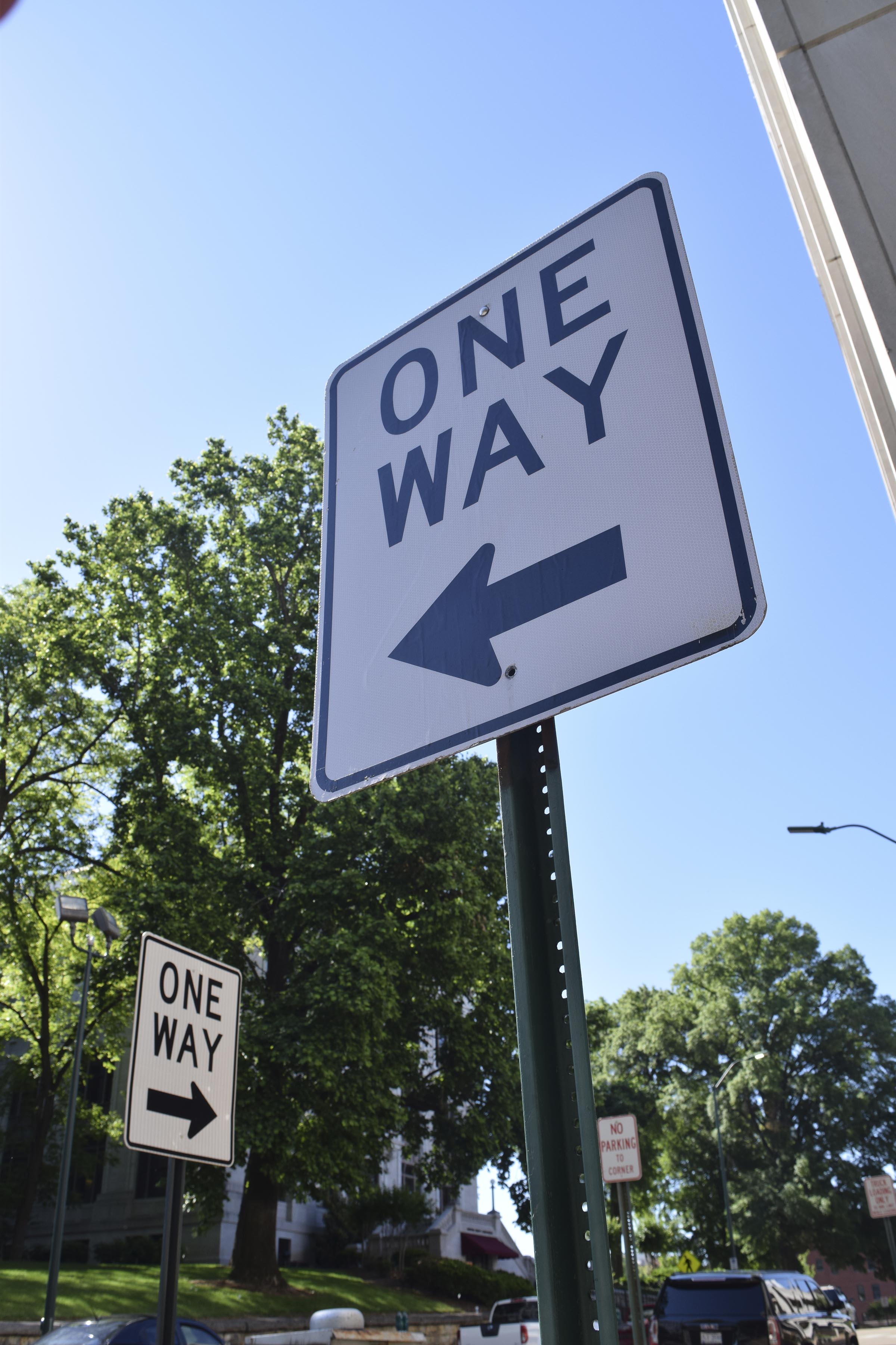 One-way signs direct motorists at the corner of Walnut and 6th streets. The Chattanooga City Council will decide at its meeting tonight whether to spend about $70,000 to study doing away with one-way streets in downtown.
