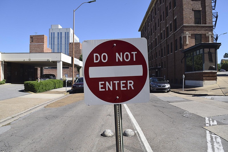 A do not enter sign warns drivers  on Georgia Avenue that Walnut Street  street is one way.  The Chattanooga City Council will decide at its meeting tonight whether to spend about $70,000 to study doing away with one-way streets in downtown.  