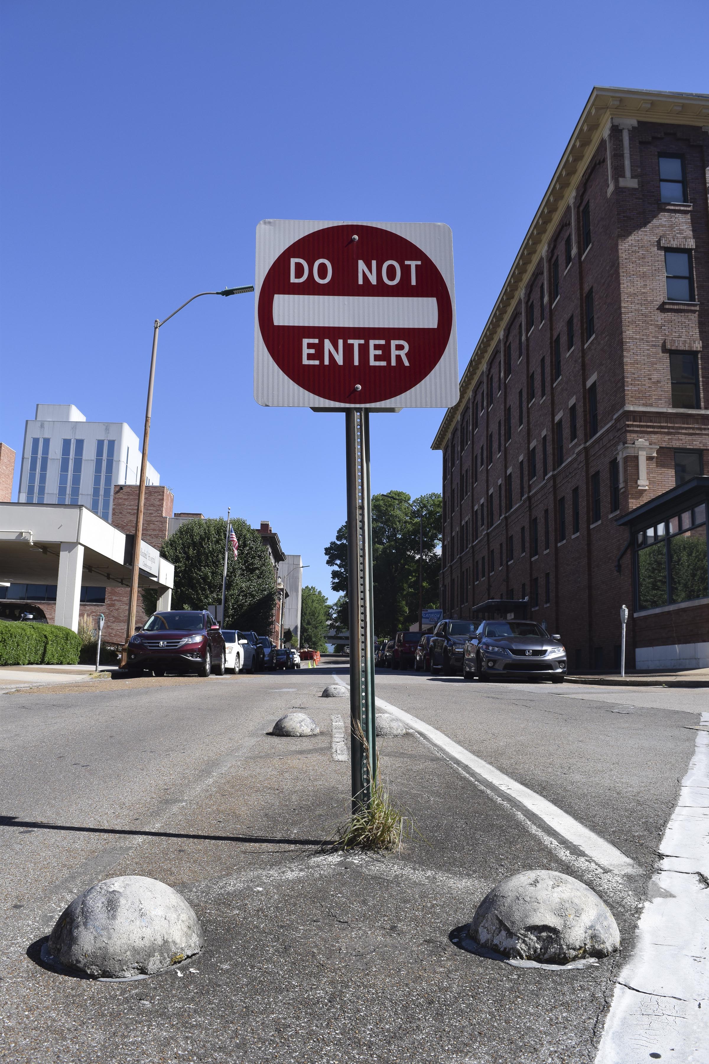 A do not enter sign warns drivers on Georgia Avenue that Walnut Street street is one way. The Chattanooga City Council will decide at its meeting tonight whether to spend about $70,000 to study doing away with one-way streets in downtown.