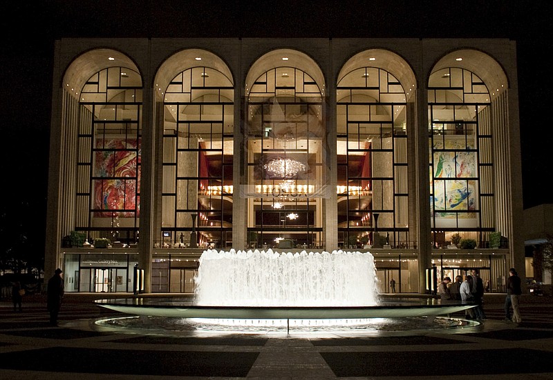 
              This 2009 image released by the Metropolitan Opera shows The Metropolitan Opera House at Lincoln Center Plaza in New York. The financially troubled Metropolitan Opera says it projects to break even for the 2016-17 season. Met general manager Peter Gelb said Monday the company’s attendance was up 3 percent this year overall and 1 percent in potential box office realized. (Jonathan Tichler/Metropolitan Opera via AP)
            