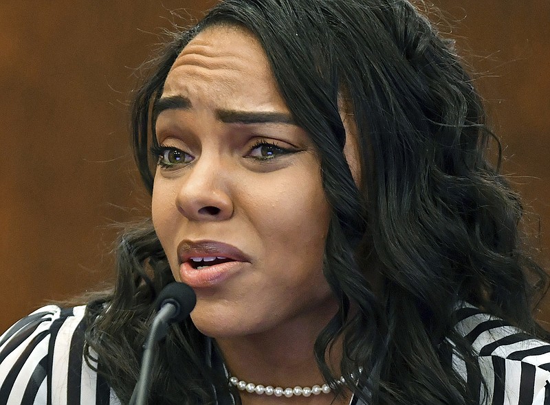 
              FILE - In this March 30, 2017, file photo, Shayanna Jenkins-Hernandez, fiancee of former New England Patriots player Aaron Hernandez, testifies in Suffolk Superior Court during his trial for the July 2012 killings of Daniel de Abreu and Safiro Furtado in Boston. Hernandez hanged himself in his prison cell on April 19, days after he was acquitted of the double murder. He was still serving a life sentence for the 2013 killing of Odin Lloyd. (Josh Reynolds/The Boston Globe via AP, Pool, File)
            