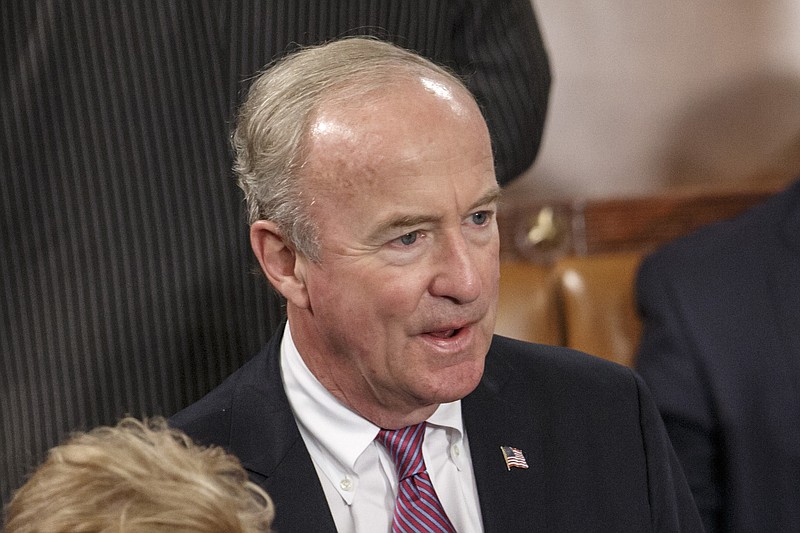 
              FILE – In this Sept. 18, 2014, file photo, U.S. Rep. Rodney Frelinghuysen, R-N.J., attends a joint meeting of Congress in the House of Representatives chamber at the Capitol in Washington. Saily Avelenda, a New Jersey woman who joined a group urging Frelinghuysen to distance himself from President Donald Trump's policies, said Monday, May 15, 2017, she quit her job at Lakeland Bank after Frelinghuysen's fundraising letter to the bank included a handwritten note saying a "ringleader" of the protest movement worked there, Monday, May 15, 2017. (AP Photo/J. Scott Applewhite, File)
            
