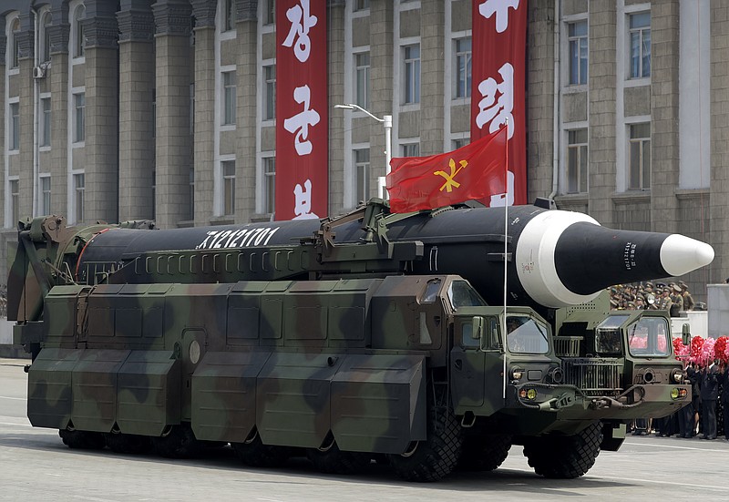 
              ADDS DETAIL ABOUT MISSILE - In this April 15, 2017, file photo, an unidentified missile that analysts believe could be the North Korean Hwasong-12 is paraded across Kim Il Sung Square in Pyongyang.  The country's official Korean Central News Agency said the missile fired Sunday, May 14, 2017, was a Hwasong-12 "capable of carrying a large-size heavy nuclear warhead." The Hwasong-10 appeared in the military parade in Pyongyang on April 15, 2017, followed by this unidentified missile.  (AP Photo/Wong Maye-E, File)
            