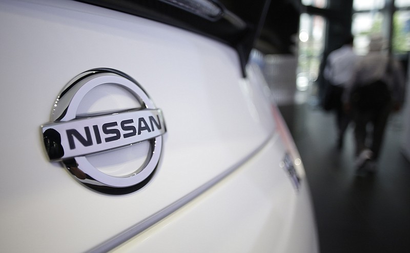
              FILE - In this May 11, 2017 file photo, the emblem of a Nissan car is seen at its showroom in Tokyo.   Japan has fallen victim of a global "ransomware" cyberattack that has created chaos in 150 countries.  Nissan Motor Co. confirmed Monday, May 15, 2017,  some units had been targeted, but there was no major impact on its business. (AP Photo/Eugene Hoshiko, File)
            