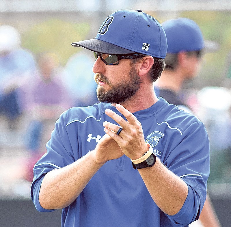 Boyd-Buchanan coach Taylor Gilley encourages his team. His Bucs held off a South Pittsburg rally on Monday night to win 6-5.