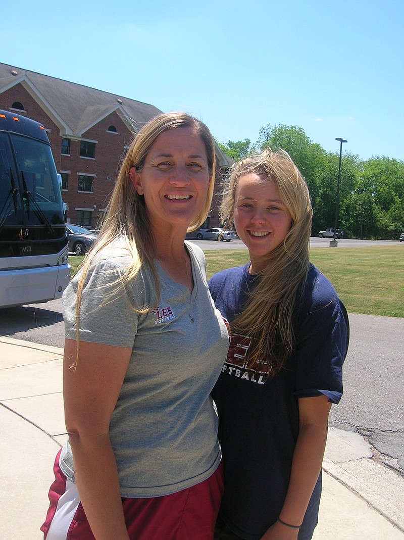 Lee University softball coach Emily Russell counts on center fielder Courtney Crawford, right, for senior leadership on a youthful group of Lady Flames. Lee is one of 16 teams still alive in the 2017 NCAA Division II national playoffs.