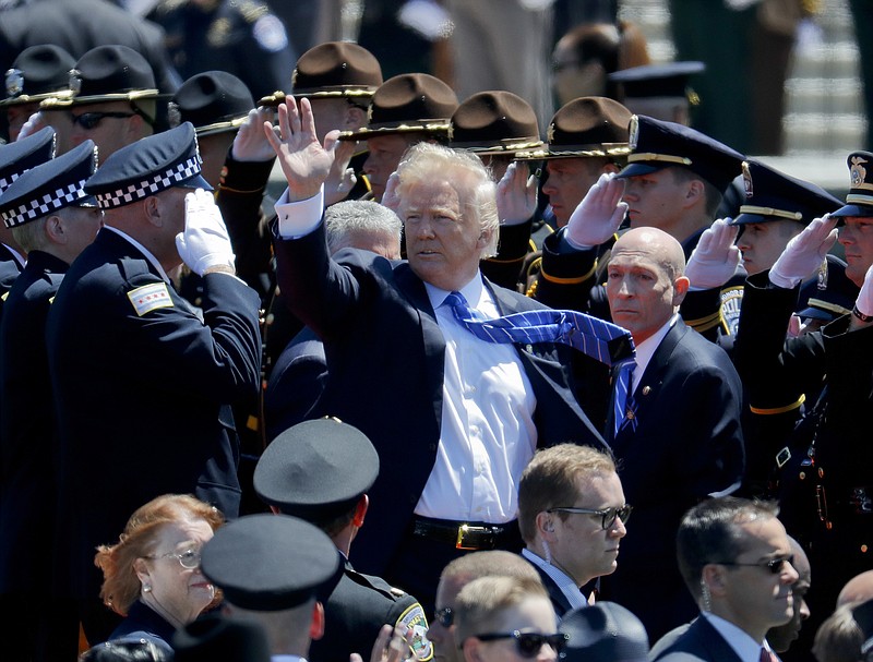 
              President Donald Trump waves as he leaves after speaking at the 36th Annual National Peace Officers' memorial service, Monday, May 15. 2017, on Capitol Hill in Washington. (AP Photo/Pablo Martinez Monsivais)
            