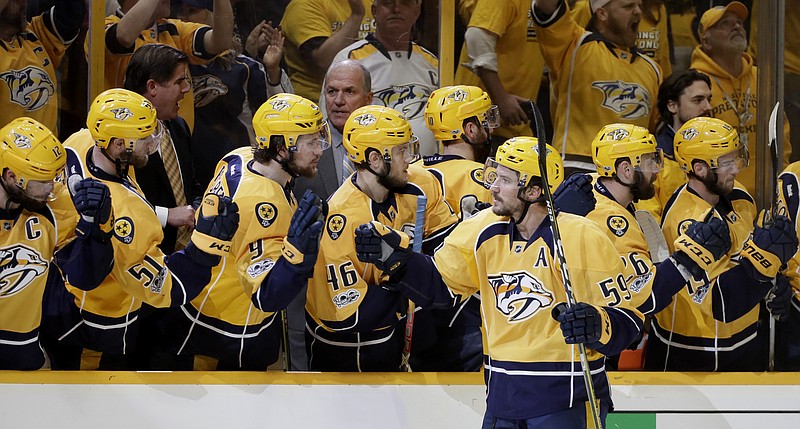 
              Nashville Predators defenseman Roman Josi (59), of Switzerland, is congratulated after scoring the go-ahead goal during the third period in Game 3 of the Western Conference final in the NHL hockey Stanley Cup playoffs Tuesday, May 16, 2017, in Nashville, Tenn. The Predators won 2-1. (AP Photo/Mark Humphrey)
            