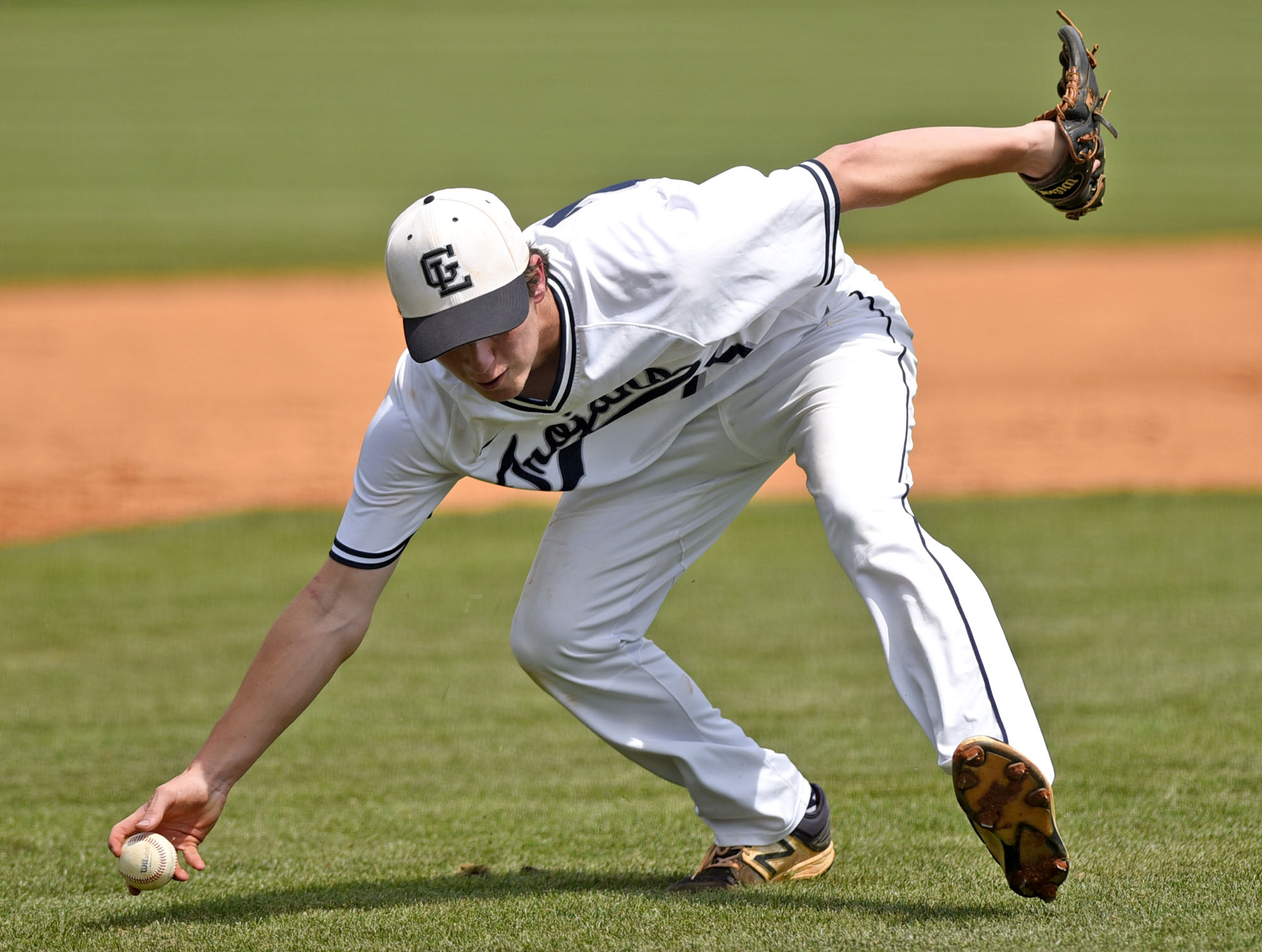 Gordon Lee 3rd baseman Ethan Clark (25) fields a bunt. The Charlton County Indians visited the Gordon Lee Trojans in the Georgia State Baseball Tournament Semifinals on May 17, 2017.