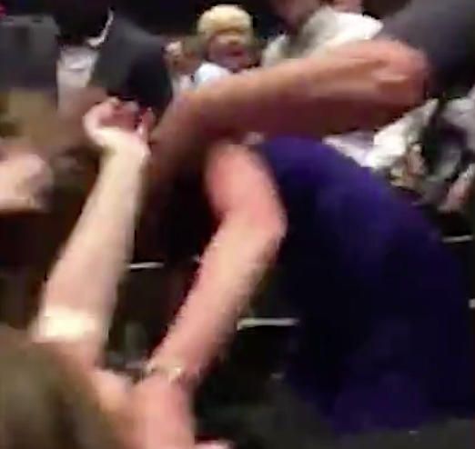 A screenshot shows a brawl breaking out at a Memphis-area high school graduation ceremony.