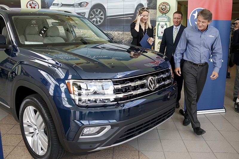 Tennessee gubernatorial candidate Randy Boyd checks out his newly purchased Volkswagen Atlas at Village Volkswagen on Thursday, May 18, 2017, in Chattanooga, Tenn. Boyd purchased the first Chattanooga-made Atlas.