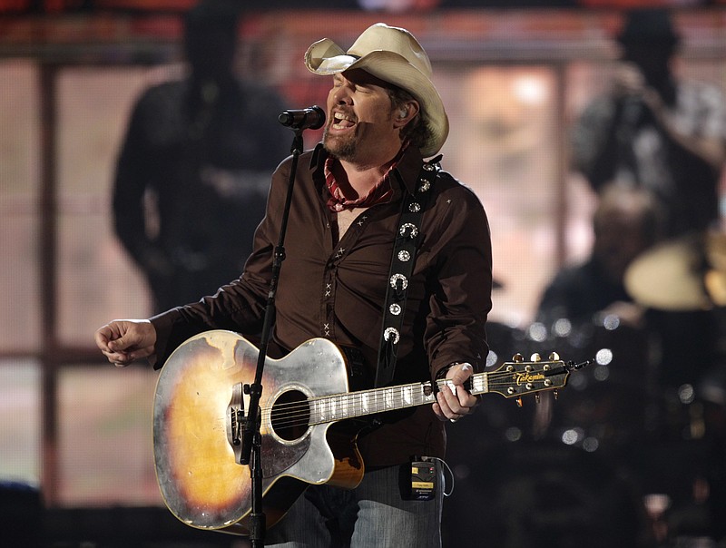 
              FILE -- In this April 3, 2011 file photo, American country singer, Toby Keith performs at the 46th Annual Academy of Country Music Awards in Las Vegas, CA. Keith, known for songs such as "Whiskey Girl" and "Beer For My Horses," is scheduled to perform in the Saudi capital, Riyadh, Saturday, May 20, 2017,  in an event that coincides with President Donald Trump's first overseas visit. Saudi entertainment website Lammt, which is advertising the event, says the free concert, which will also feature an Arabian lute player, is open to men only. (AP Photo/Julie Jacobson, File)
            