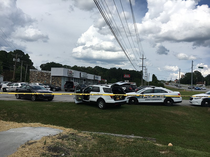A SWAT and hostage negotiation team have been called to Highway 58 and Eller Road behind the Ace Hardware to negotiate with a man after an alleged domestic assault.