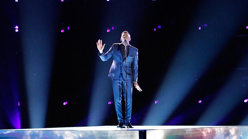 Chris Blue sings "Take Me to the King" in last week's semifinals of "The Voice." His performance of the praise song propelled him into tonight's finals.