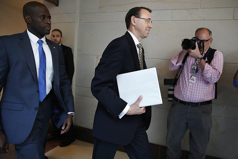 
              Deputy Attorney General Rod Rosenstein arrives on Capitol Hill in Washington, Thursday, May 18, 2017, for a closed-door meeting with Senators a day after appointing former FBI Director Robert Mueller to oversee the investigation into possible ties between Russia and President Donald Trump's campaign.  (AP Photo/Jacquelyn Martin)
            