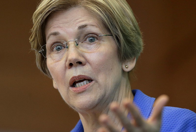 
              FILE- In this March 27, 2017, file photo, U.S. Sen. Elizabeth Warren, D-Mass., addresses business leaders during a New England Council luncheon in Boston. Warren is slated to deliver the commencement address at Boston’s Wheelock College on Friday, May 19. (AP Photo/Steven Senne, File)
            