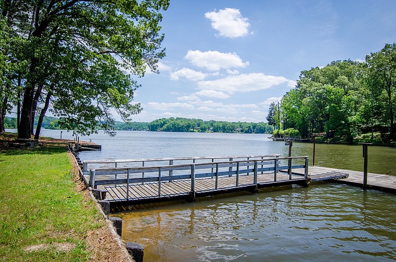 The auction of the former Provident lakefront property in Harrison failed to draw enough bids for an immediate sale of 44.5 acres on Chickamauga Lake.