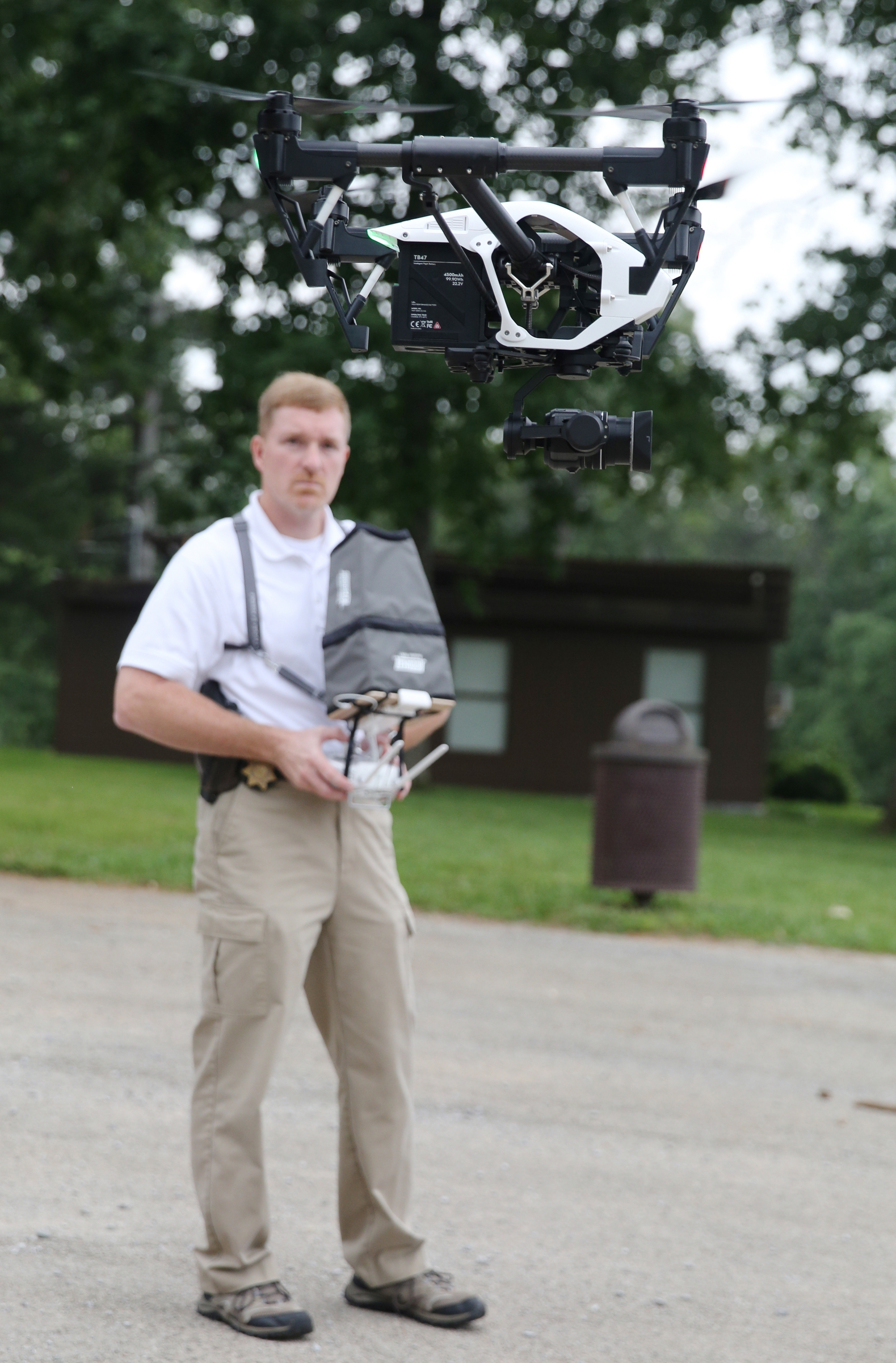 Hamilton County Sheriff's Office Detective Marty Dunn flies an unmanned aerial surveillance system Friday, May 19, 2017, at Chester Frost Park in Hixson, Tenn. Unmanned aerial surveillance systems, or drones, are used to gather photographic and video evidence over crime and traffic accident scenes, for search and rescue missions, training missions and more.