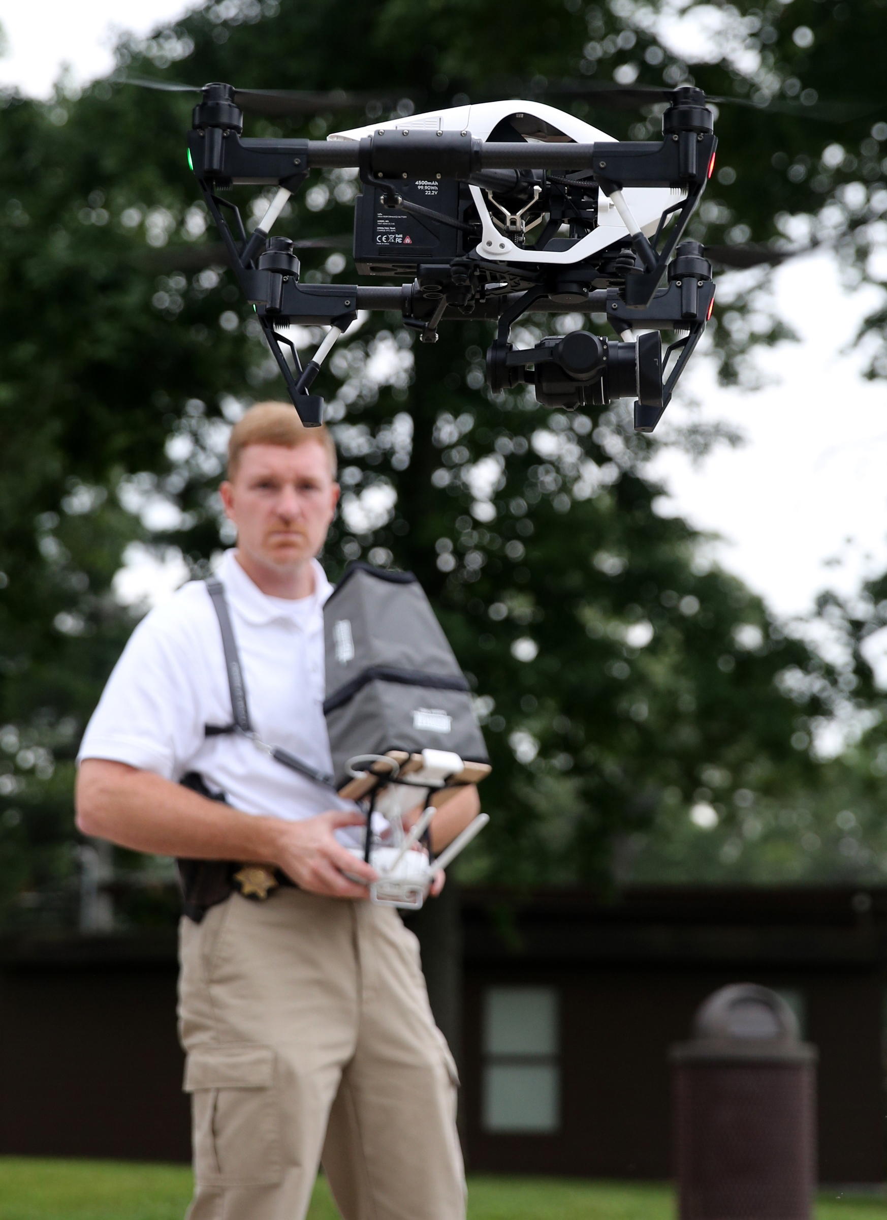 Hamilton County Sheriff's Office Detective Marty Dunn flies an unmanned aerial surveillance system Friday, May 19, 2017, at Chester Frost Park in Hixson, Tenn. There are five Hamilton County Sheriff's Office personnel who have been trained to operate the unmanned aerial surveillance systems used by the sheriff's office.