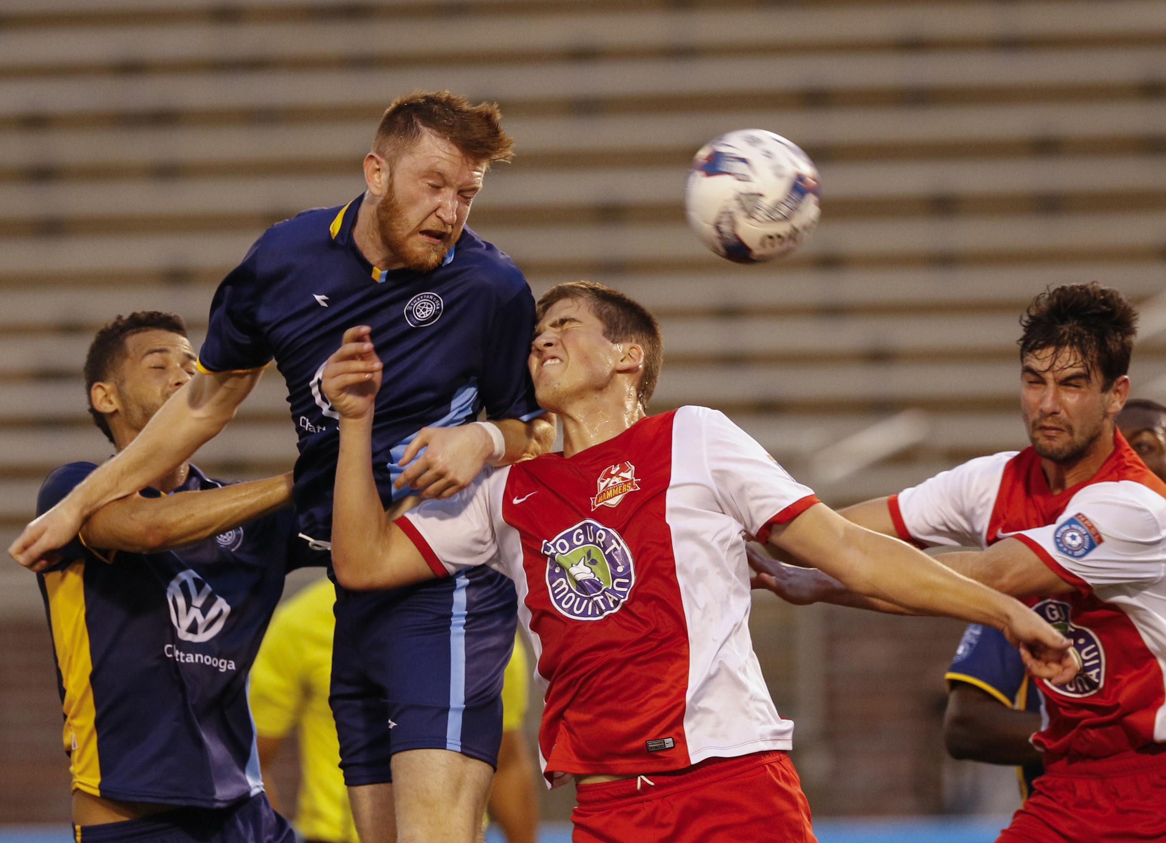 CFC's Carl Reynolds, center left, heads the ball for a shot on the goal during Chattanooga FC's home opener against the Birmingham Hammers at Finley Stadium on Saturday, May 20, 2017, in Chattanooga, Tenn.