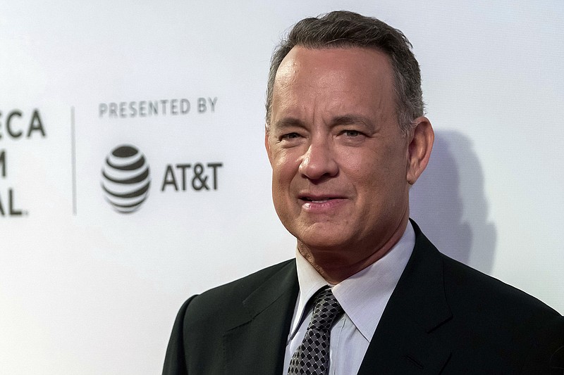 
              FILE - In this April 26, 2017 file photo, Tom Hanks attends "The Circle" premiere during the 2017 Tribeca Film Festival in New York. Hanks is on the beat in New York City, using Twitter Saturday, May 20, 2017, to alert police to a car with a slew of tickets on its windshield. Turns out the tickets were paid. (Photo by Charles Sykes/Invision/AP, File)
            