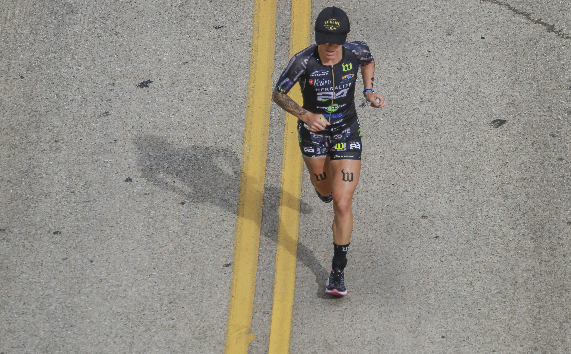 Heather Jackson starts out the run with a nice lead before winning the 2017 Sunbelt Bakery IRONMAN 70.3 Chattanooga triathlon presented by McKee A Family Bakery for the second year in downtown Chattanooga on Sunday, May 21, 2017. Photo by Dan Henry | DanHenryPhotography.com