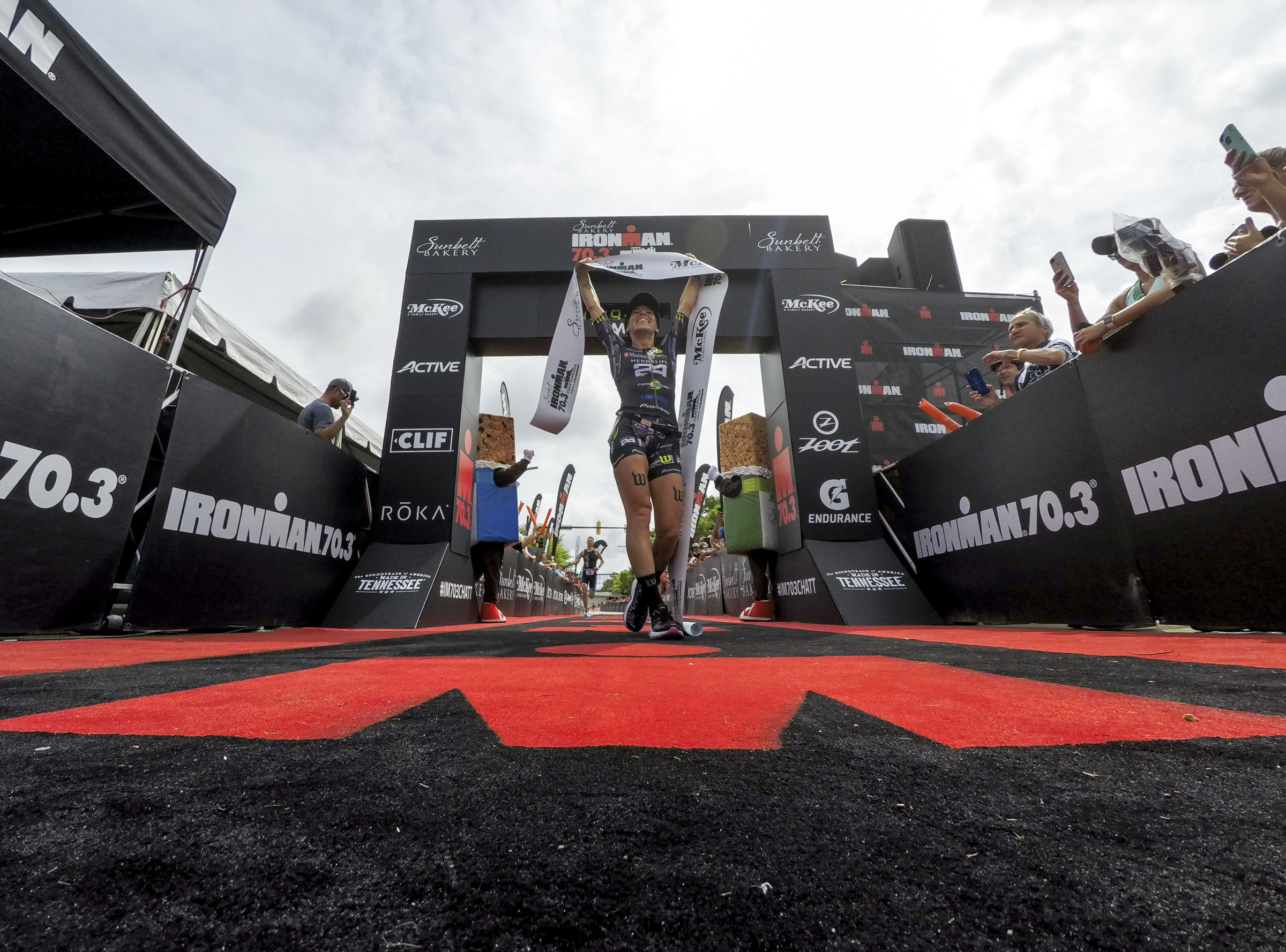 Heather Jackson takes the win for the second year in a row during the Sunbelt Bakery IRONMAN 70.3 Chattanooga triathlon presented by McKee A Family Bakery in downtown Chattanooga on Sunday, May 21, 2017. Photo by Dan Henry | DanHenryPhotography.com