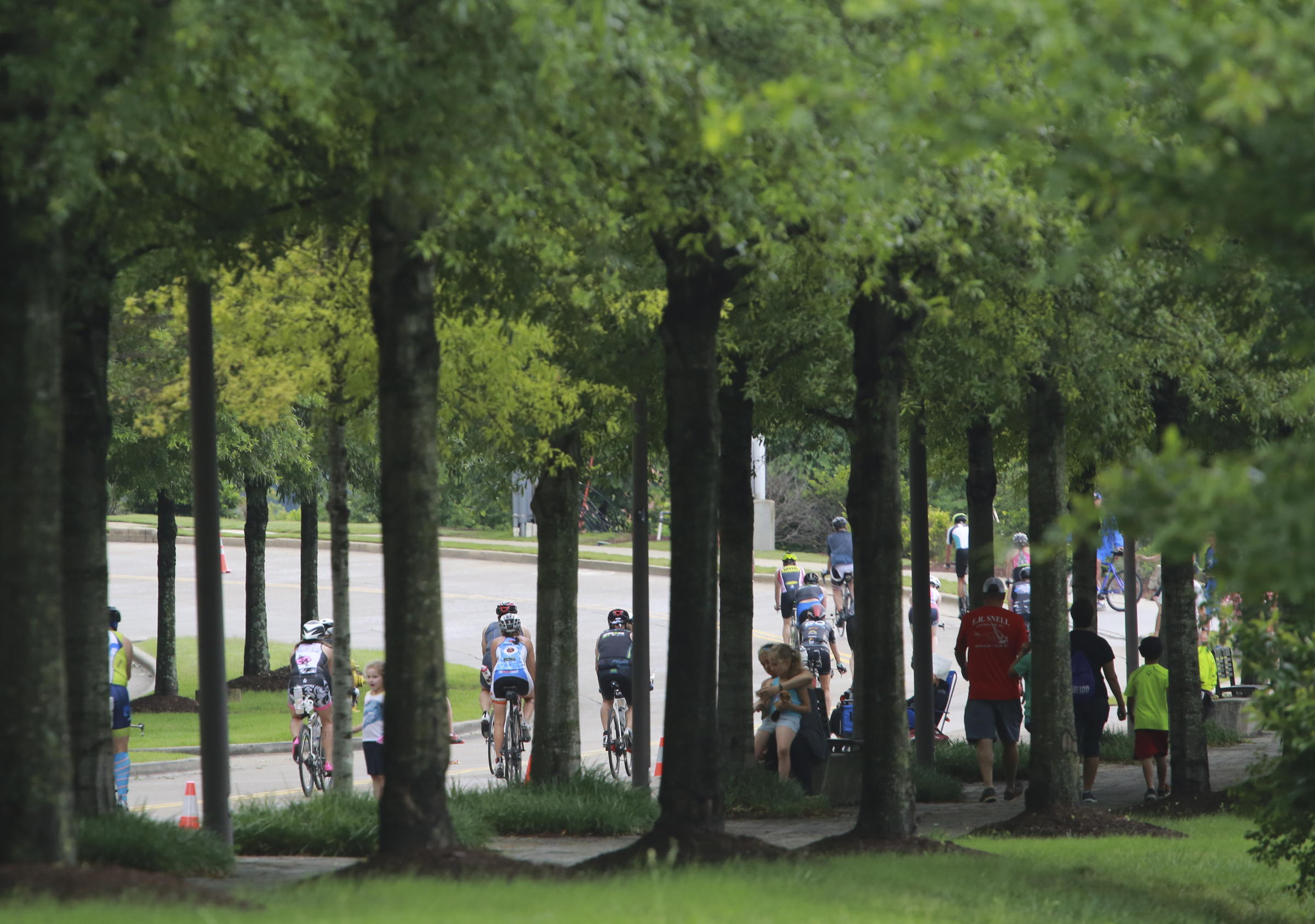 Age group athletes begin the bike leg while competing in the Sunbelt Bakery IRONMAN 70.3 Chattanooga triathlon presented by McKee A Family Bakery in downtown Chattanooga on Sunday, May 21, 2017. Photo by Dan Henry | DanHenryPhotography.com
