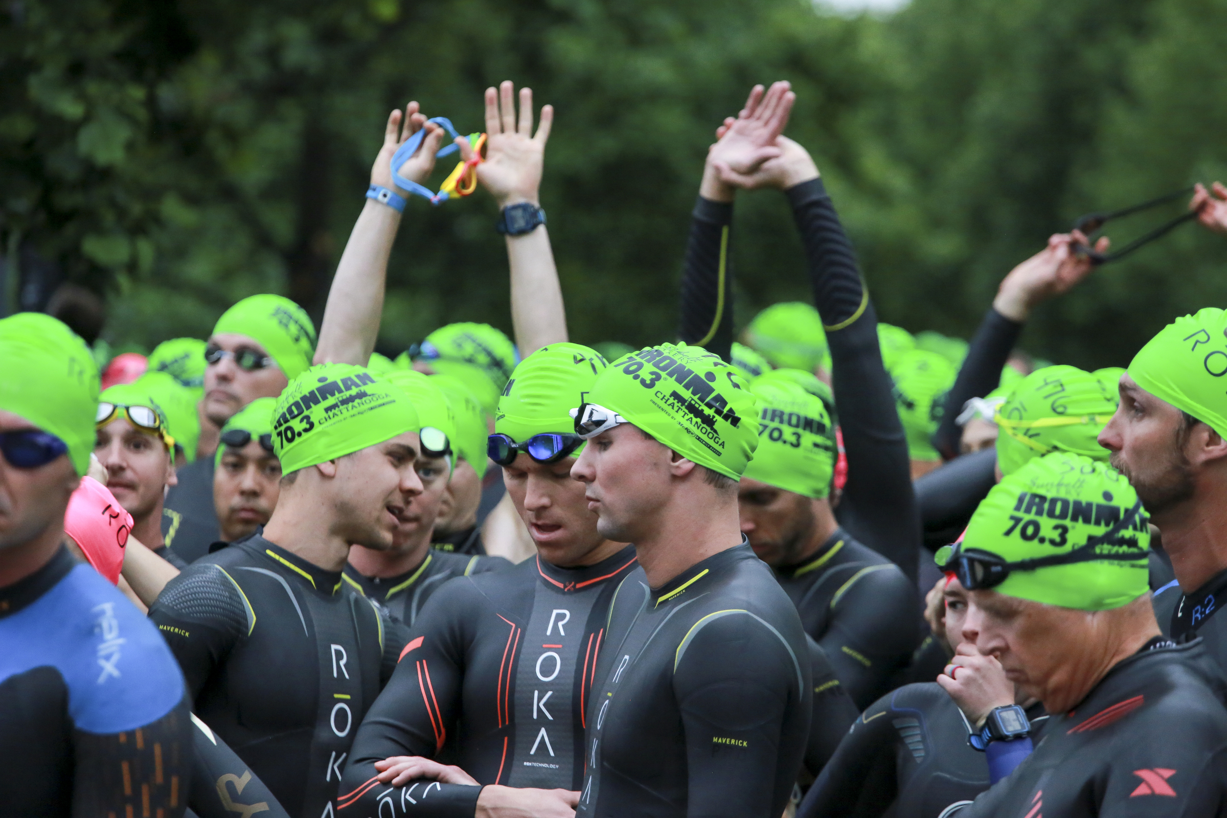 Age group athletes line up for the swim before competing in the Sunbelt Bakery IRONMAN 70.3 Chattanooga triathlon presented by McKee A Family Bakery in downtown Chattanooga on Sunday, May 21, 2017. Photo by Dan Henry | DanHenryPhotography.com