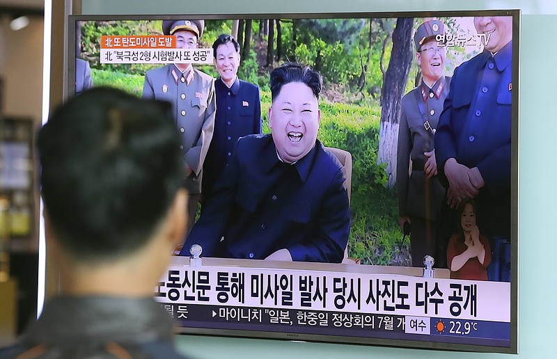 
              A man watches a TV news program showing image of North Korean leader Kim Jong Un, published in the North Korea's Rodong Sinmun newspaper, at Seoul Railway station in Seoul, South Korea, Monday, May 22, 2017. North Korea fired a solid-fuel ballistic missile Sunday that can be harder for outsiders to detect before launch and later said the test was hailed as perfect by leader Kim Jong Un. (AP Photo/Lee Jin-man)
            