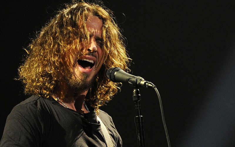 
              FILE - In this Feb. 13, 2013 file photo, Chris Cornell of Soundgarden performs during the band's concert at the Wiltern in Los Angeles. Cornell, 52, who gained fame as the lead singer of the bands Soundgarden and Audioslave, died at a hotel in Detroit and police said Thursday, May 18, 2017, that his death is being investigated as a possible suicide. (Photo by Chris Pizzello/Invision/AP, File)
            