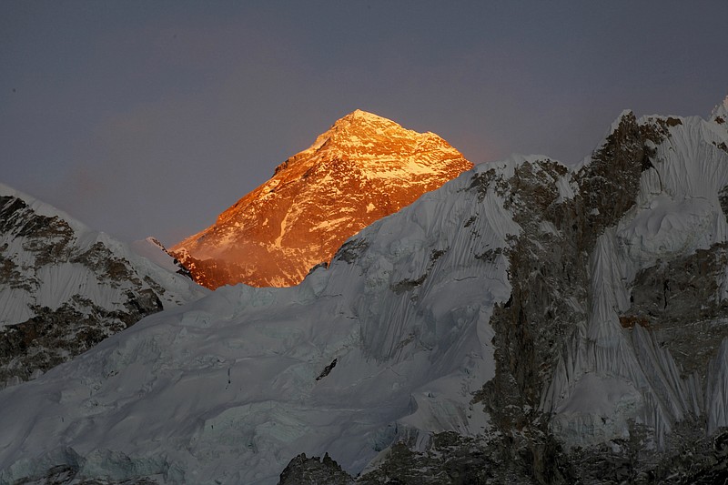 In this Nov. 12, 2015, file photo, Mt. Everest is seen from the way to Kalapatthar in Nepal. An American climber has died near the summit of Mount Everest and an Indian climber is missing after heading down from the mountain following a successful ascent, expedition organizers said Sunday. (AP Photo/Tashi Sherpa, File)