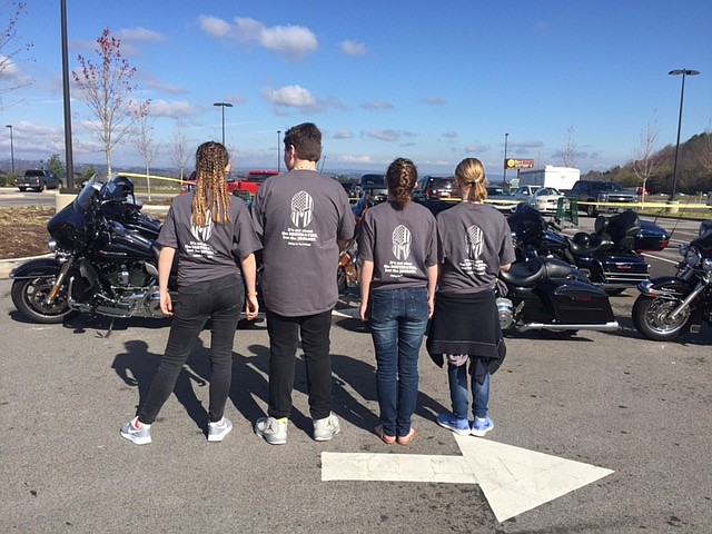 Teens from The Cottage pose at the Roughnecks Motoycycle Club's annual ride. (Contributed photo)