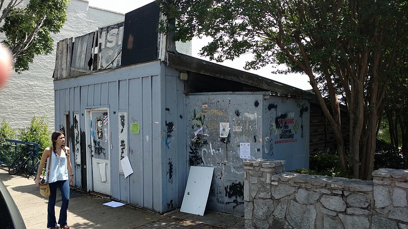 The former Northside Lunch building on Frazier Avenue near the Walnut Street Bridge is for sale. The structure has been criticized for falling into a rundown condition.