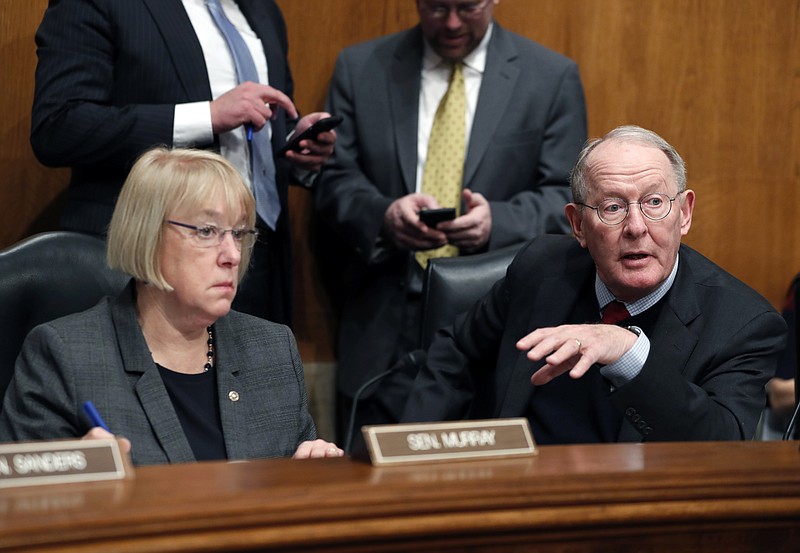 
              FILE - In this Jan. 31, 2017 file photo, Senate Health, Education, Labor, and Pensions Committee Chairman Sen. Lamar Alexander, R-Tenn., accompanied by the committee's ranking member Sen. Patty Murray, D-Wash. speaks on Capitol Hill in Washington. In closed-door meetings, Senate Republicans are trying to write legislation dismantling President Barack Obama’s health care law. They would substitute their own tax credits, ease coverage requirements and cut the federal-state Medicaid program for the poor and disabled that Obama enlarged.  (AP Photo/Alex Brandon, File)
            