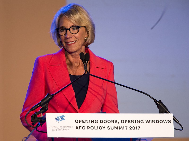 
              Education Secretary Betsy DeVos speaks at a summit hosted by American Federation for Children in Indianapolis, Monday, May 22, 2017. DeVos said the Donald Trump administration is proposing "the most ambitious expansion" of school choice in American history. (Robert Scheer/The Indianapolis Star via AP)
            