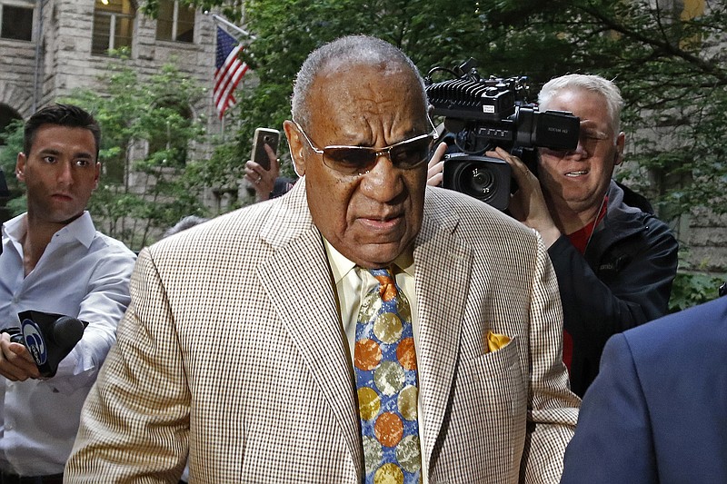 
              Bill Cosby, center, arrives for jury selection in his sexual assault case at the Allegheny County Courthouse, Monday, May 22, 2017, in Pittsburgh. The case is set for trial June 5 in suburban Philadelphia. (AP Photo/Gene J. Puskar)
            