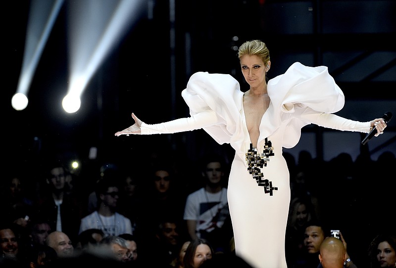 
              Celine Dion performs "My Heart will Go On" at the Billboard Music Awards at the T-Mobile Arena on Sunday, May 21, 2017, in Las Vegas. (Photo by Chris Pizzello/Invision/AP)
            