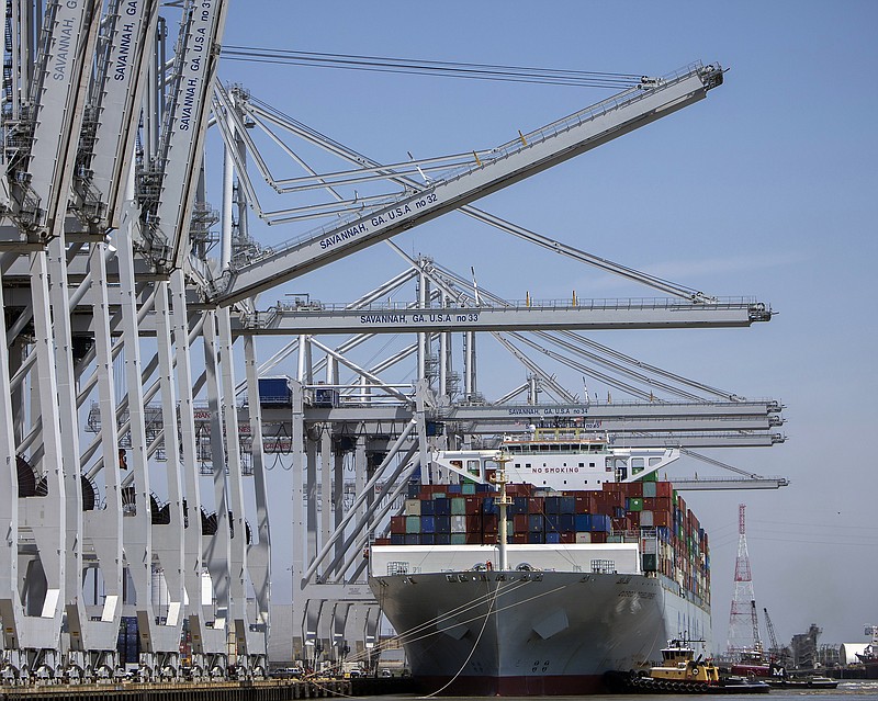 In this photo provided by the Georgia Port Authority, Georgia Ports Authority, neo-panamax ship to shore cranes start work on the container ship Cosco Development at the Port of Savannah, Thursday, May 11, 2017, in Garden City, Ga. The ship is the largest vessel ever to call on the U.S. East Coast. (AP Photo/Georgia Port Authority, Stephen Morton)
