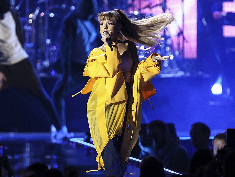 In this Sept. 24, 2016, file photo, Ariana Grande performs at the 2016 iHeartRadio Music Festival in Las Vegas. Police say there are "a number of fatalities" after reports of an explosion at an Ariana Grande concert at Manchester Arena in northern England on Monday, May 22, 2017.. (Photo by John Salangsang/Invision/AP, File)