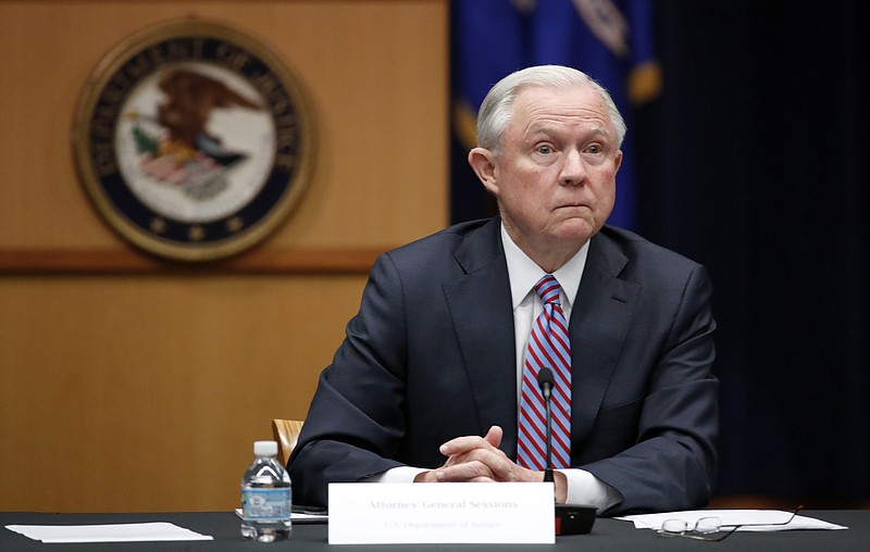 
              FILE - This April 18, 2017 file photo shows Attorney General Jeff Sessions at the Justice Department in Washington. Sessions said in a department memorandum on Monday, May 22, that the department may "tailor grants to promote a lawful system of immigration." That suggests officials could seek ways to withhold money from communities that refuse to honor detainer requests from federal immigration authorities. (AP Photo/Alex Brandon, File)
            