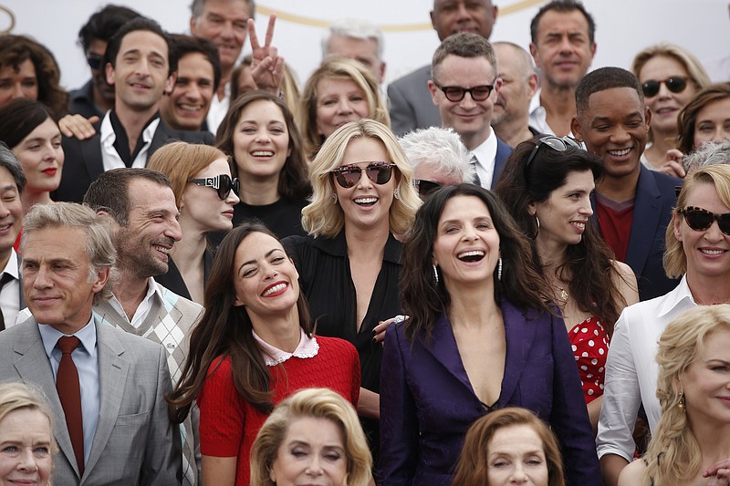
              Actors and directors form former Cannes selections pose for photographers during the photo call for the 70th Anniversary of the international film festival, Cannes, southern France, Tuesday, May 23, 2017. (AP Photo/Thibault Camus)
            
