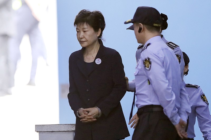 
              Former South Korean President Park Geun-hye leaves after her trial at the Seoul Central District Court in Seoul, South Korea, Tuesday, May 23, 2017. (AP Photo/Lee Jin-man)
            