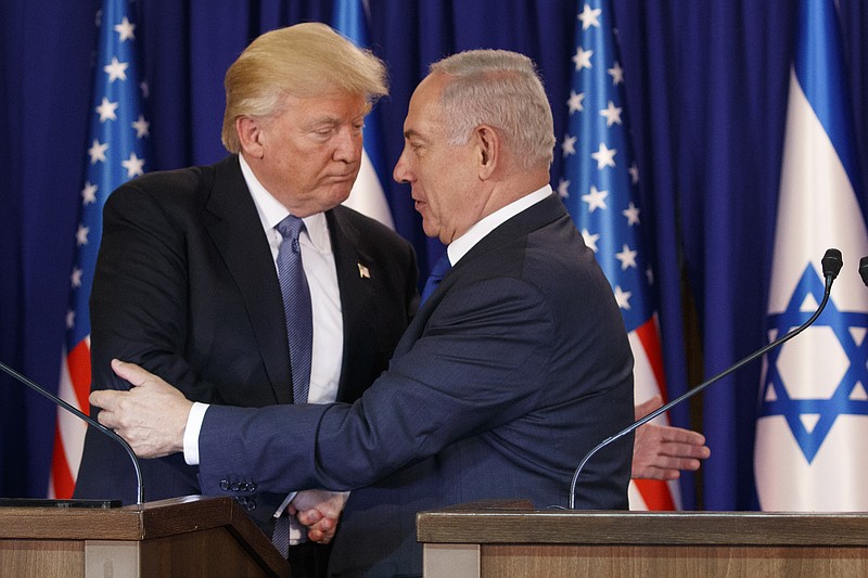 President Donald Trump shakes hands with Israeli Prime Minister Benjamin Netanyahu after making a joint statement in Jerusalem, Monday, May 22, 2017. (AP Photo/Evan Vucci)