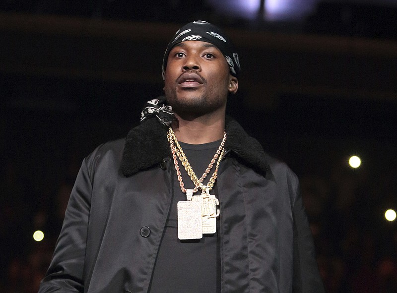 
              FILE - In this Oct. 28, 2016 file photo, rapper Meek Mill appears at the Power 99 Powerhouse 2016 concert in Philadelphia. Meek Mill and a Connecticut theater are being sued over a fatal shooting outside the venue following a concert in December. The shooting outside the Oakdale Theatre in Wallingford killed 31-year-old Travis Ward and 20-year-old Jaquan Graves, both of New Haven. Two others were injured. (Photo by Owen Sweeney/Invision/AP, File)
            