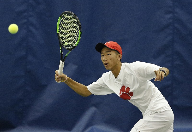 Baylor's Ethan Palisoc returns the ball during his TSSAA Division II Class AA boys team tennis finals match against Montgomery Bell Academy on Wednesday, May 24, 2017, in Murfreesboro, Tenn.