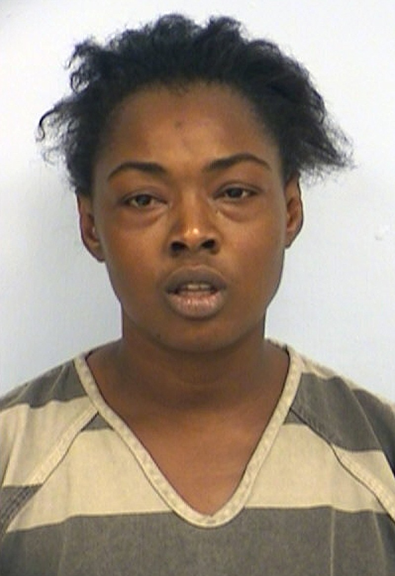 
              This undated photo provided by the Austin Police Department shows Jennifer Lampkin. Lampkin, a 35-year-old Austin, Texas native, has spent over a year in county jail, waiting for treatment in a mental hospital after she was accused of slapping a young girl in a Dollar General store but deemed both mentally ill and intellectually disabled by a judge. She is one of hundreds of Texans jailed rather than placed in a mental hospitals despite being deemed incompetent for trial and in need of psychological treatment. (Austin Police Department via AP)
            